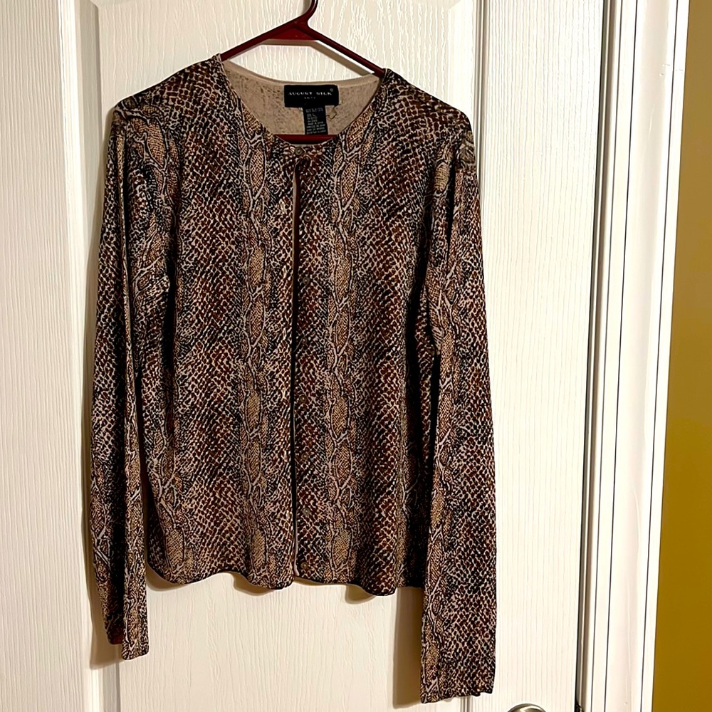 Long sleeve silk knit top.